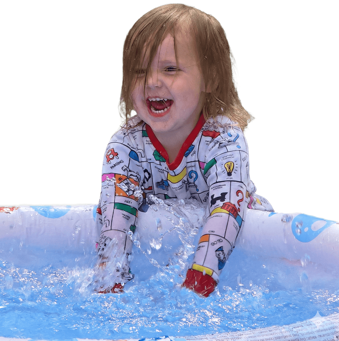 Happy child playing in water